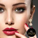 Rose Radiance Stone-Studded Jhumka Earrings